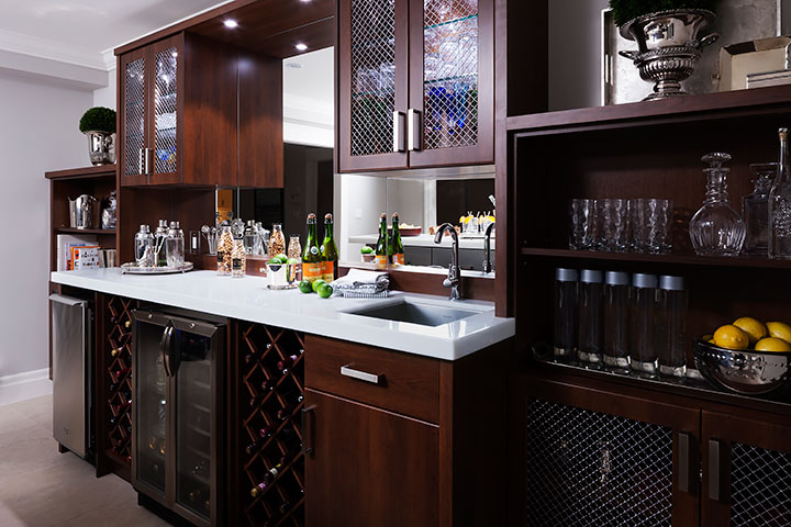 bar cabinetry that carries around from the kitchen